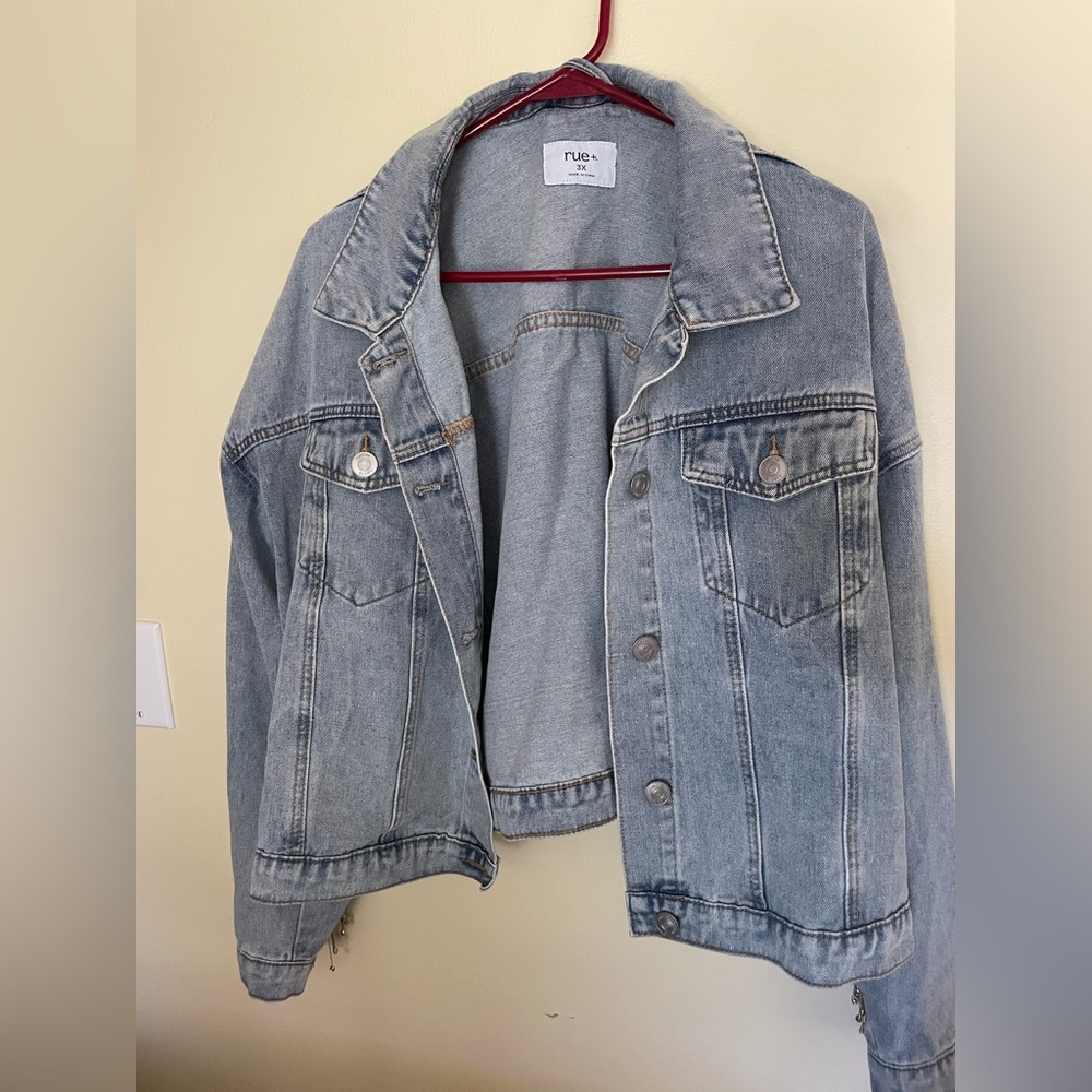 Denim jacket with diamonds on the back